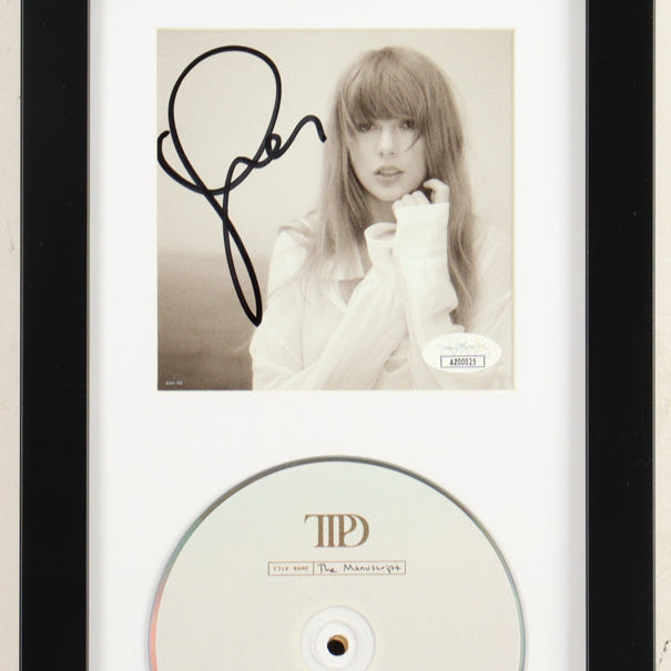Framed album cover with Taylor Swift  signature and a CD inside