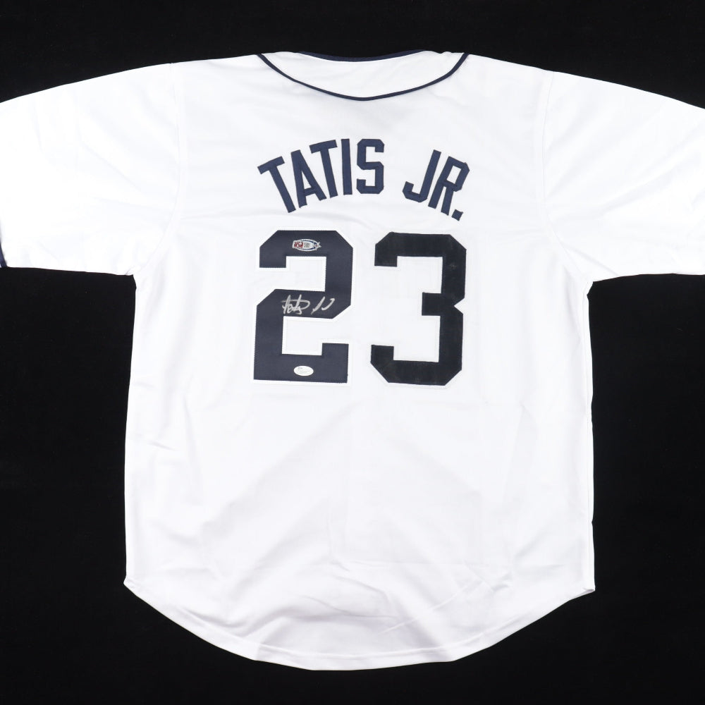 Autographed White baseball jersey with 'TATIS JR.' and number '23' on a black background