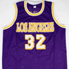 Magic Johnson Signed Purple Jersey (Beckett)